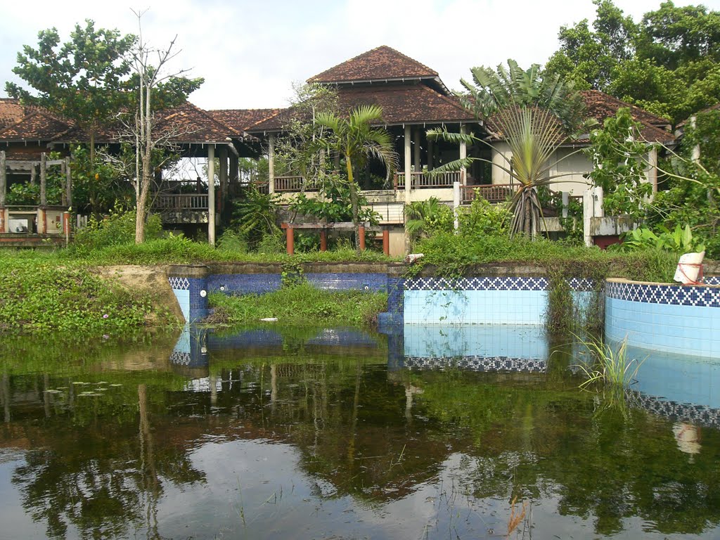 Remains of The Old Bangsak Beach Resort Pool by koen schenke