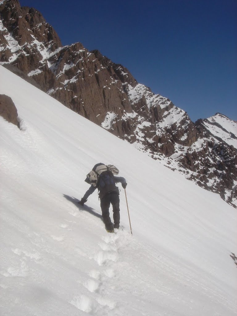 Crossing a snow field close to Tizi Ouanoums by evtychios