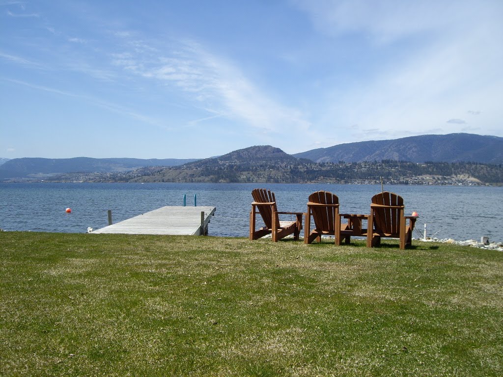 Lakeshore Inn view of lake, dock and lawn chairs by BCjewel56