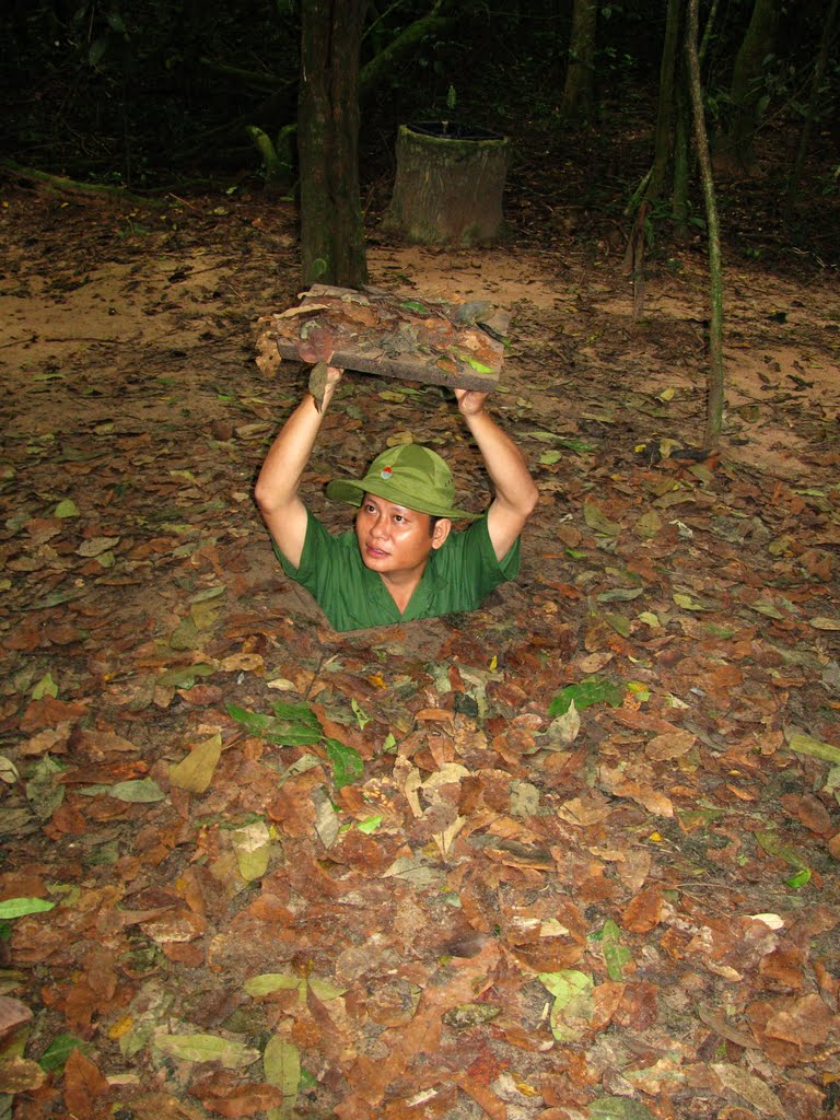 Entrance in underground city of vietcong - tunnel Cu CHI by Airone