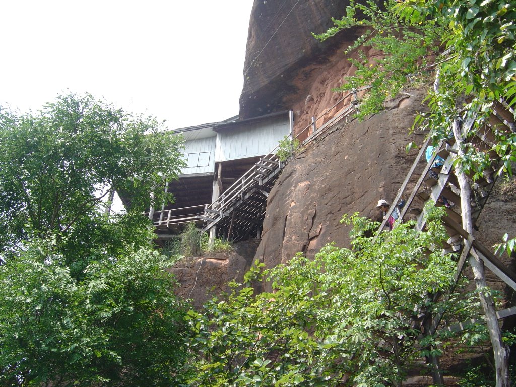 Temple on a huge rock formation near Seka Thailand by chezandy