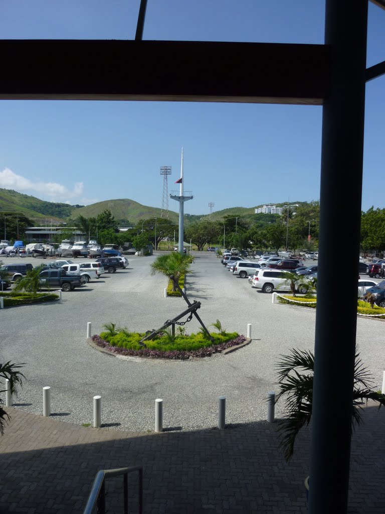 From Entrance to Royal Papua Yacht Club looking out across Car Park area to KONEDOBU, the Ship Mast is off of the MV. Mac Dhui WW11 Jap Bombed Wreck in Fairfax Harbour, Port Moresby, PNG, on 27-06-2010 by Peter John Tate