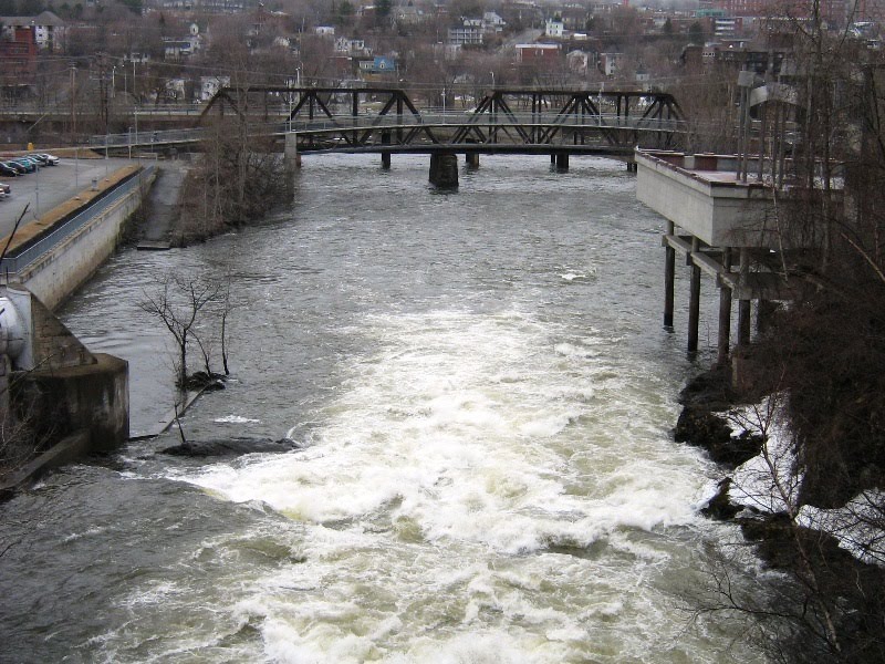 Magog river water flow at spring by Mario Hains