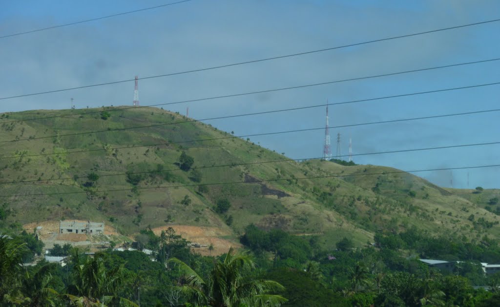 Looking over to HOHOLA area and up Burns Peak Hills with many Communication Towers, taken from along Poreporena Freeway near Waigani Drive, HOHOLA YOUTH DEVELOPMENT Centre School in lower right hand corner of photo, at end of OAK Street in Hohola, Port Moresby, PNG, on 30-06-2010 by Peter John Tate,