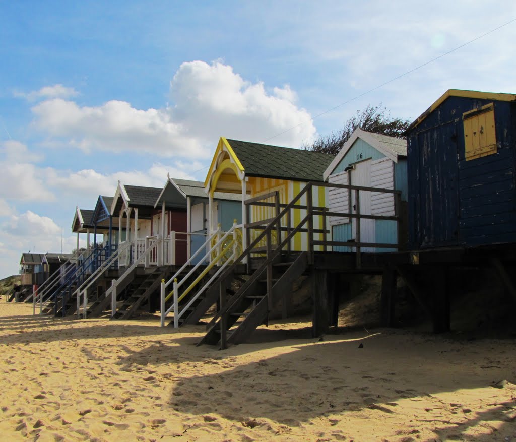 Beach huts on the coast of England by Jewels