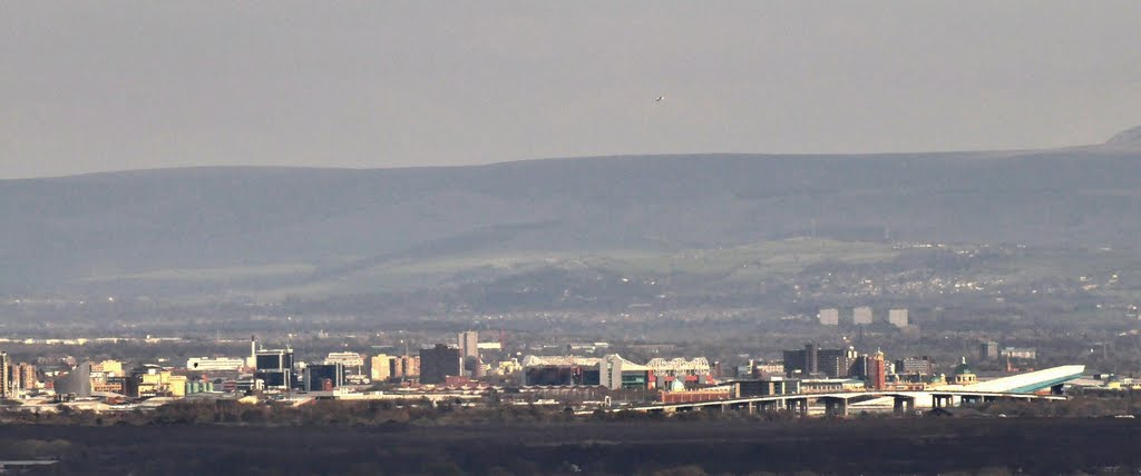 Old Trafford and Salford Quays from Billinge Hill.500mm lens by David Humphreys