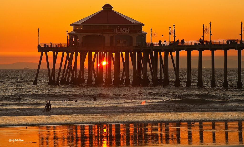 Sunset Over Huntington Beach Pier by Hoàng Khai Nhan