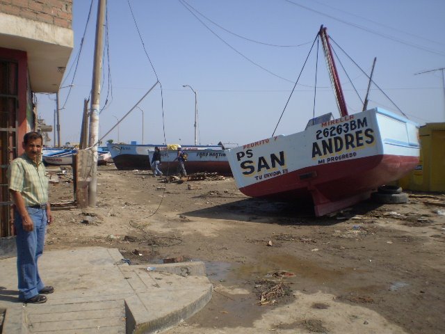 Sinclair type boat stranded on San Andrés coastal road, 18h post tsunami by Ricardo Bandin Llano…