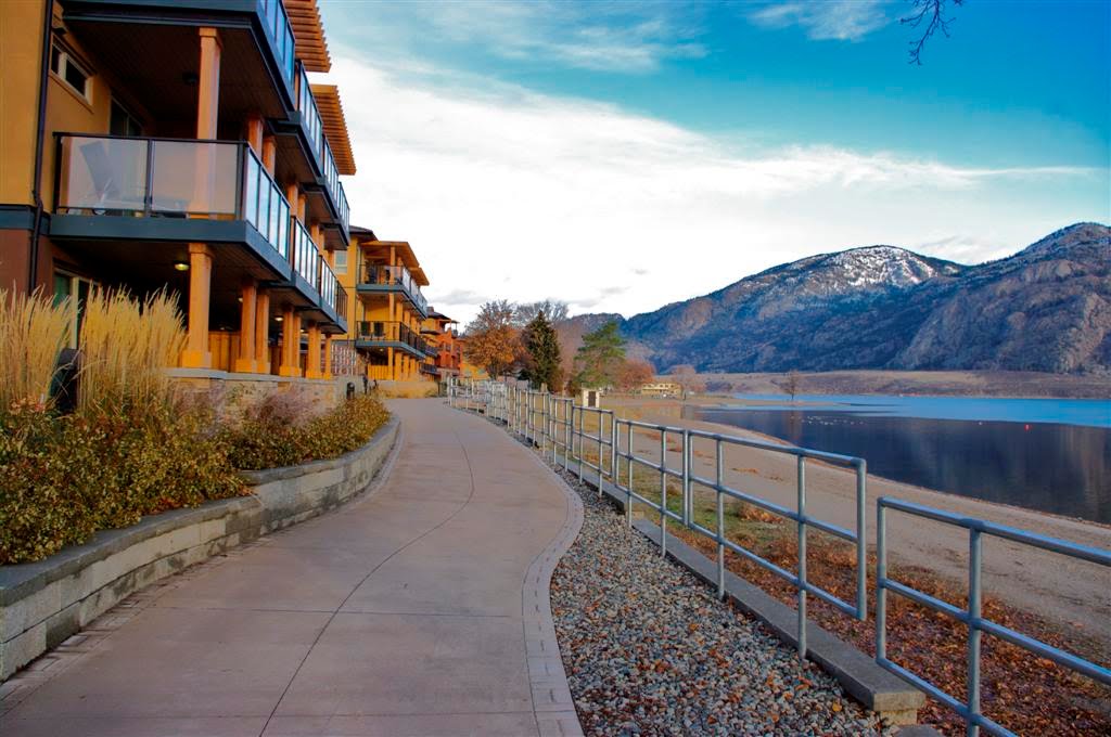 Beach walk in front of Watermark Beach Resort's Condos in December by John Greaves