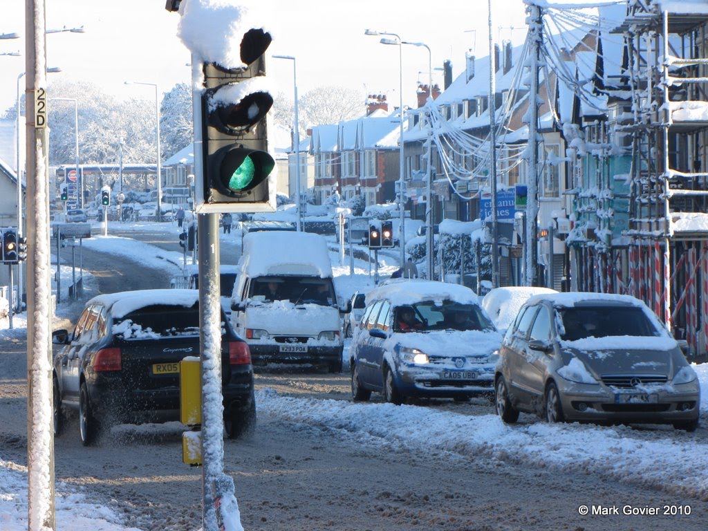 Slush and snow on the road by MarkGovier