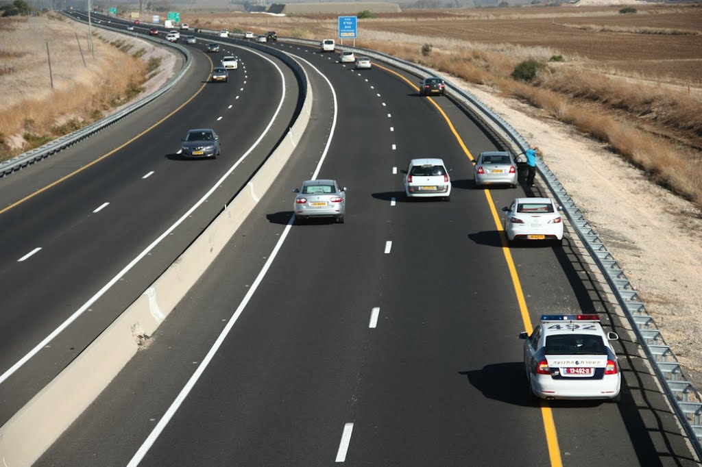 377 Coastal Road when the fire on Mount Caramel Israel by Kobi Zilberstein