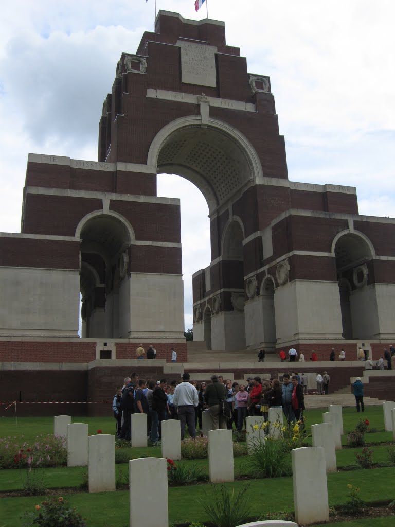 Beaumont Leys School (Leicester) students lay a wreath on the grave of an unknown Leicestershire soldier at Theipval by Kevin J. Norman