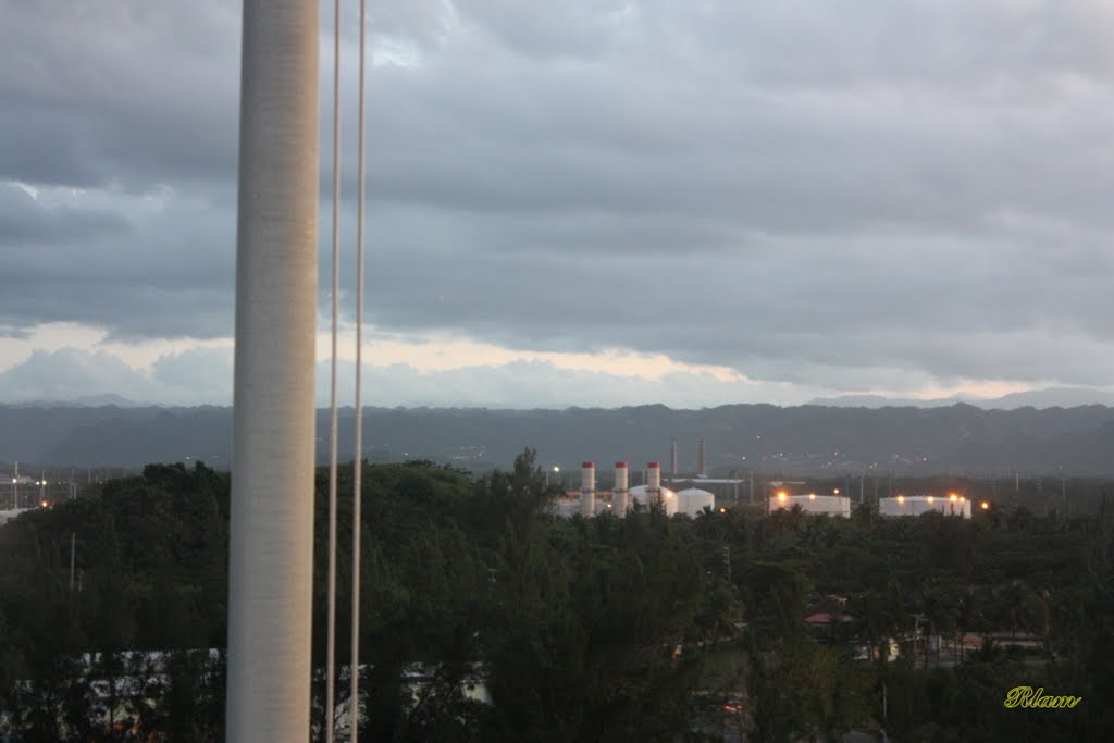 Mirando al Sur desde el Faro, las montañas de Puerto Rico a lo Lejos. by Roberto Lam