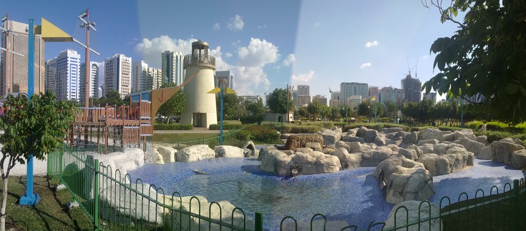 FAMILY PARK (Pond Water) by Gamal Aldahshan