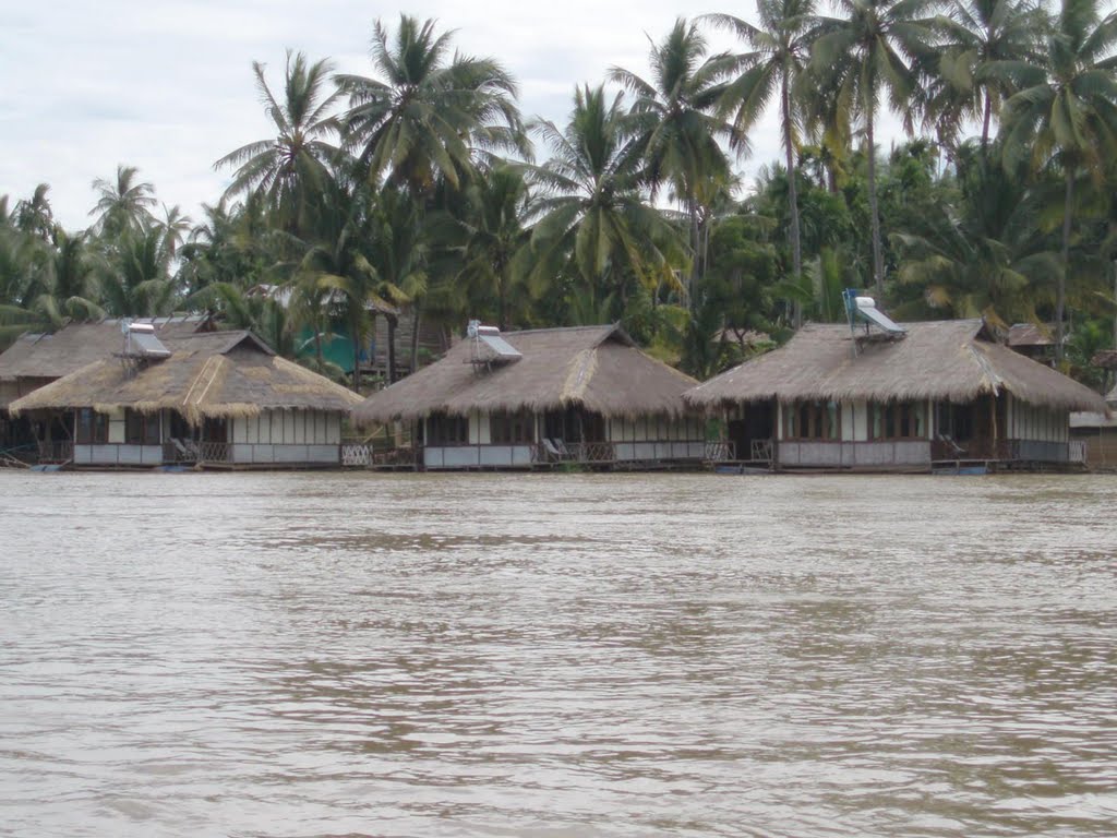 Salaphae raft houses with sun collectors on Don Khon by marhas marhas