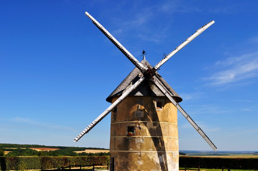 Old windmill in French countryside by grahangela