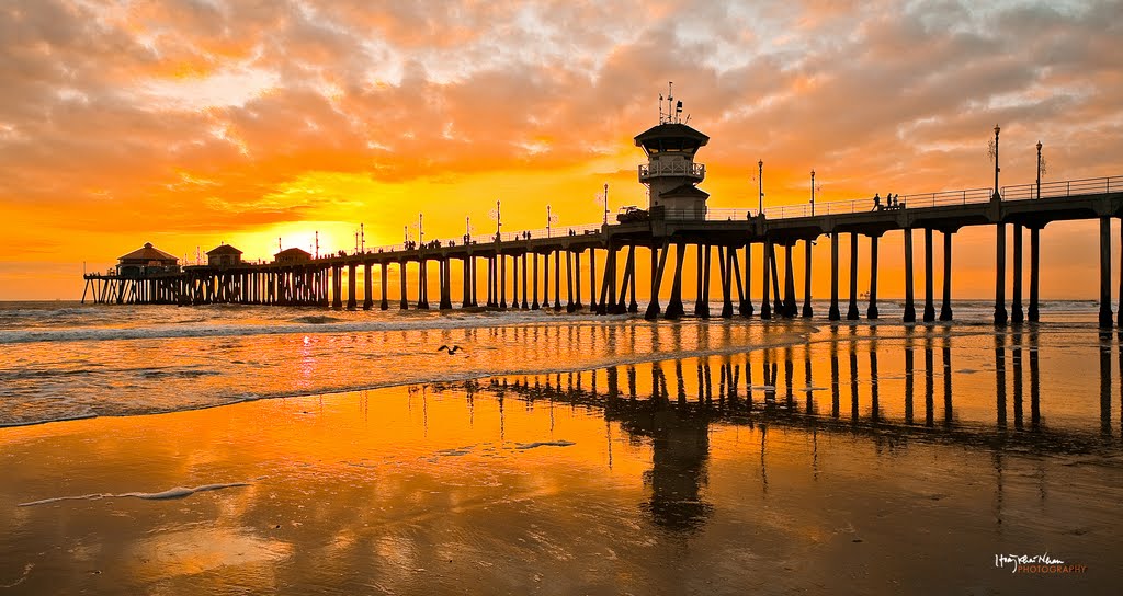 Sunset Over Huntington Beach Pier by Hoàng Khai Nhan