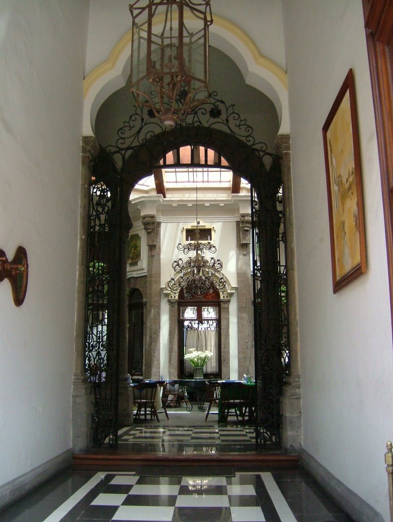 Entrance of a Traditional Restaurant in Downtown by Jorge Martinez R