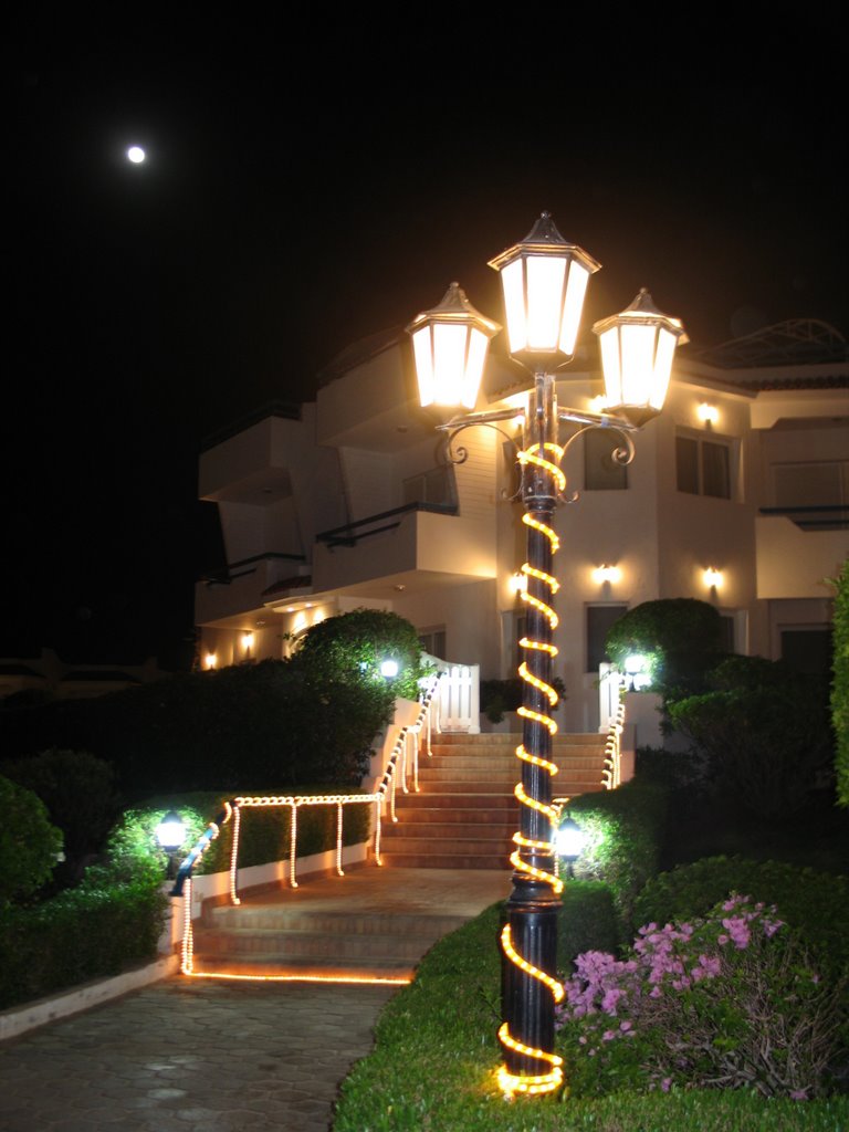 Night view of Dreams Beach Resort by Okeana