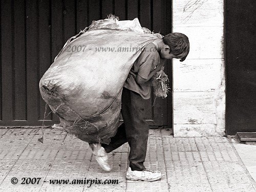 A worker child in Tehran by amirpix