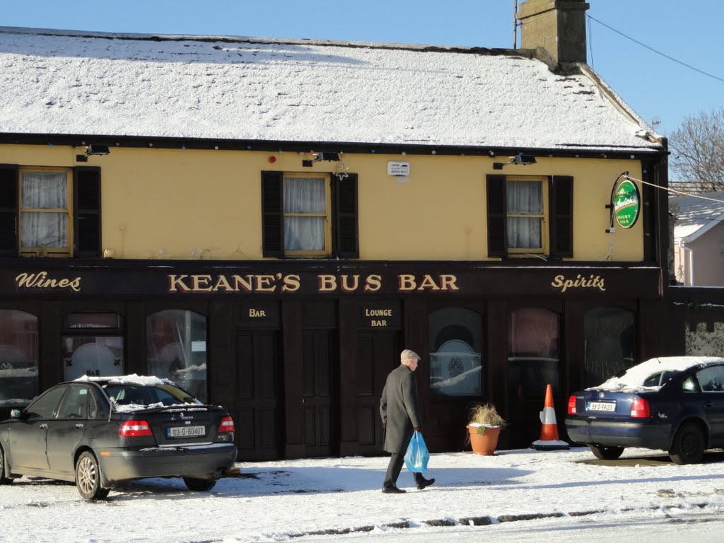 Skerries - a gentleman passing keane's Bus Bar by Roy H.