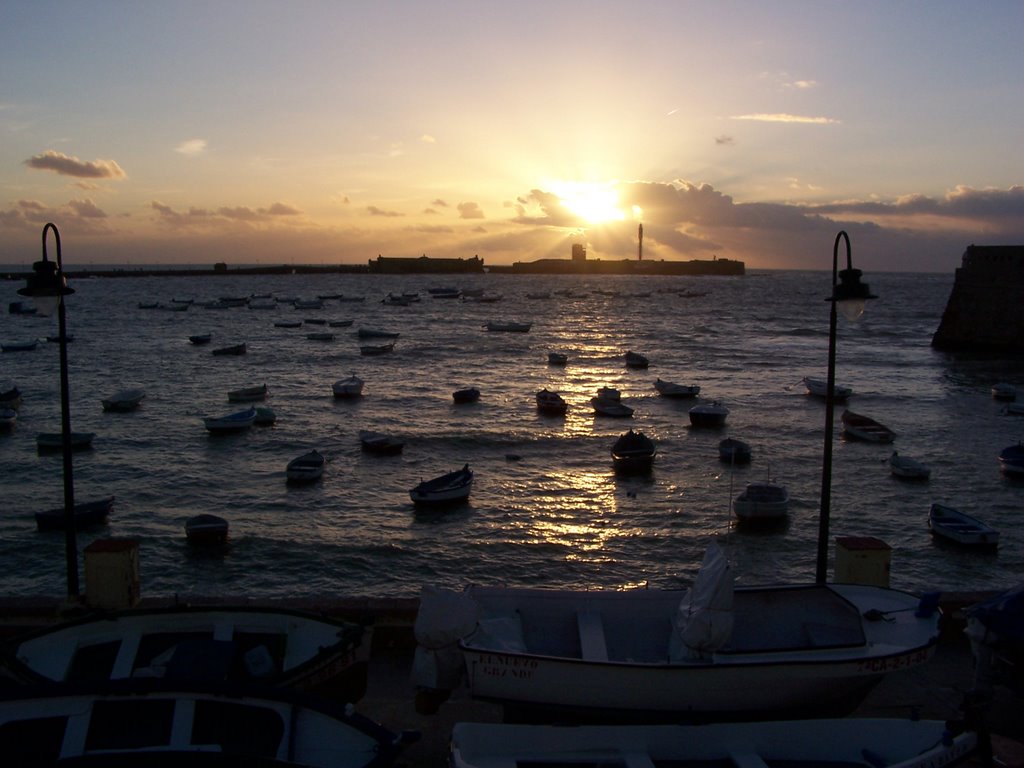 Atardecer en la playa de La Caleta by Abraham Rodriguez