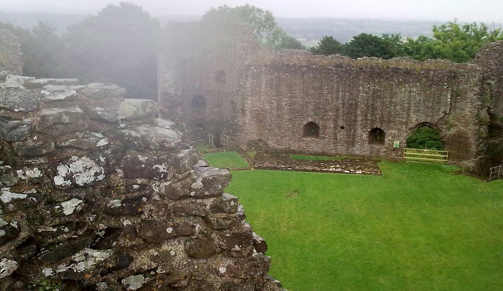 White castle enveloped in rain by david thomas