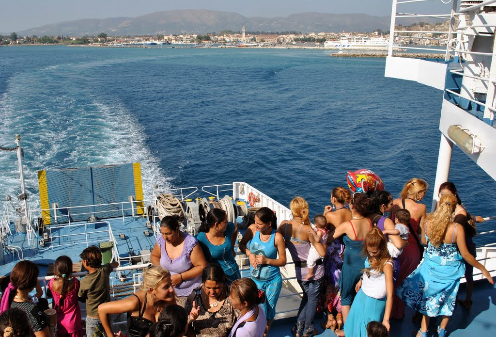 Locals on a ferry boat by ovidiu anca