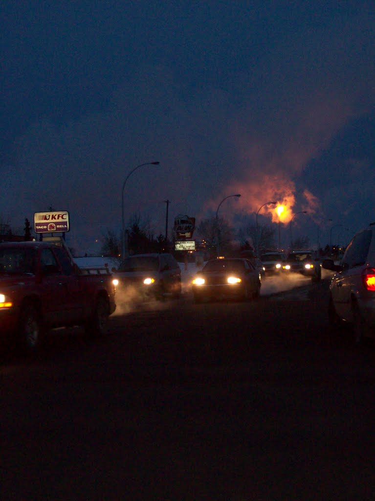 Refinery row flare off on a winter evening by dr lattice