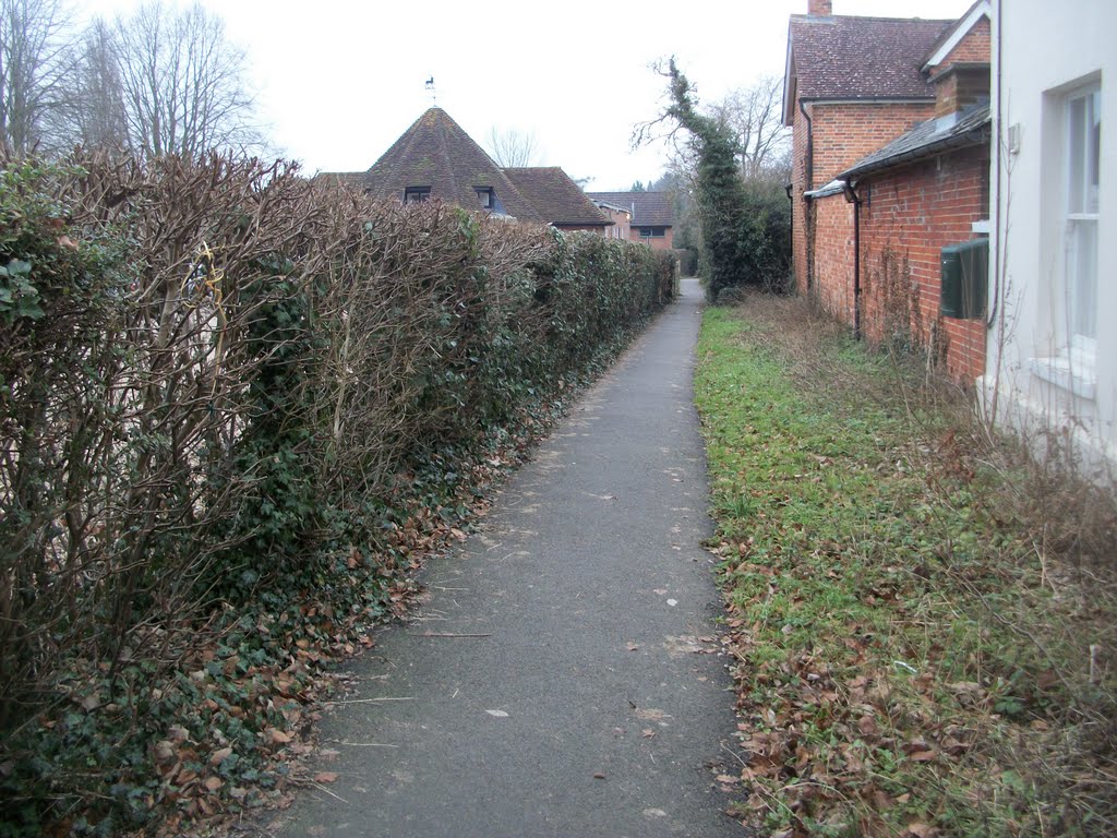 The narrow footpath, tucked beside Crondall Village Hall by Robert'sGoogleEarthPictures