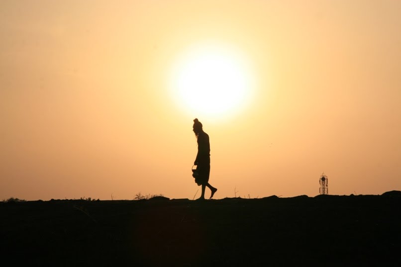 India, Khajuraho, walk for the water by Adam Karolak