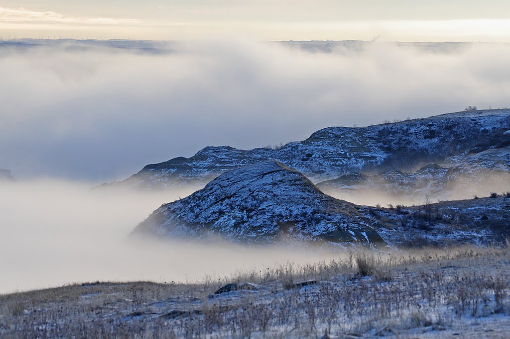 River fog in the Missouri badlands by DeVane Webster