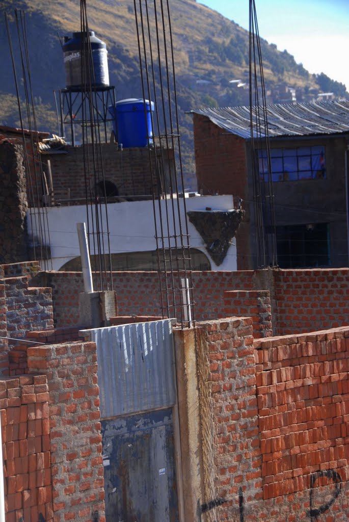 Puno in the process of building, Peru by Damon Tighe