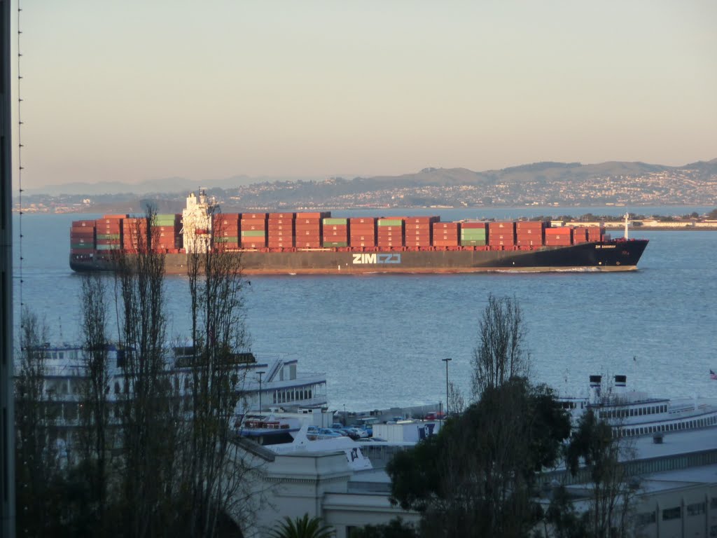 Piled high cargo ship by Glenn Macdonald