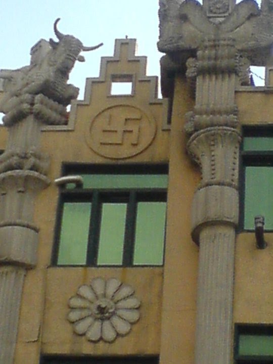 Swastika on the facade of a building in Tehran by vahidvmotlagh