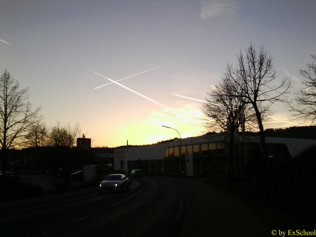 Contrails above the road by ExSchool