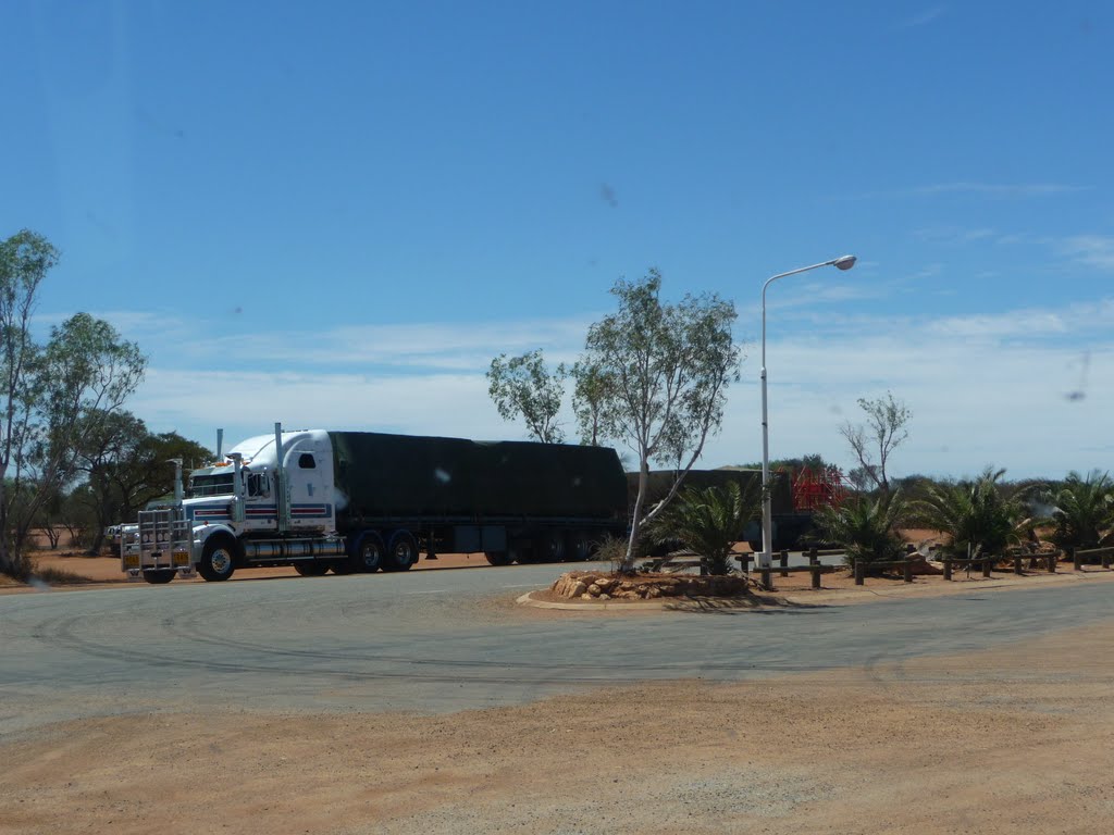 Roadtrain at Billabong Roadhouse by Michel Evers