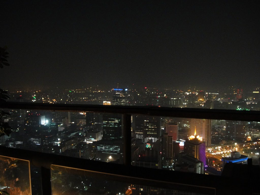 Night view from a rooftop of the Banyan Tree Bangkok Hotel by magurotororo