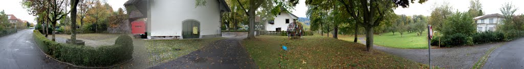 To the right you see a building, that is for decades empty. It's owner simply seem not to need it ... Panorama without any level, tripod or tools - just to capture the moment, not to achieve anything else. by Thomas Teske