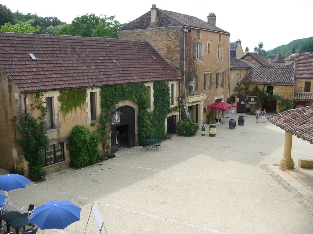 Cadouin - vue de la place du village depuis les dortoirs de l'abbaye by Athanasius Clay