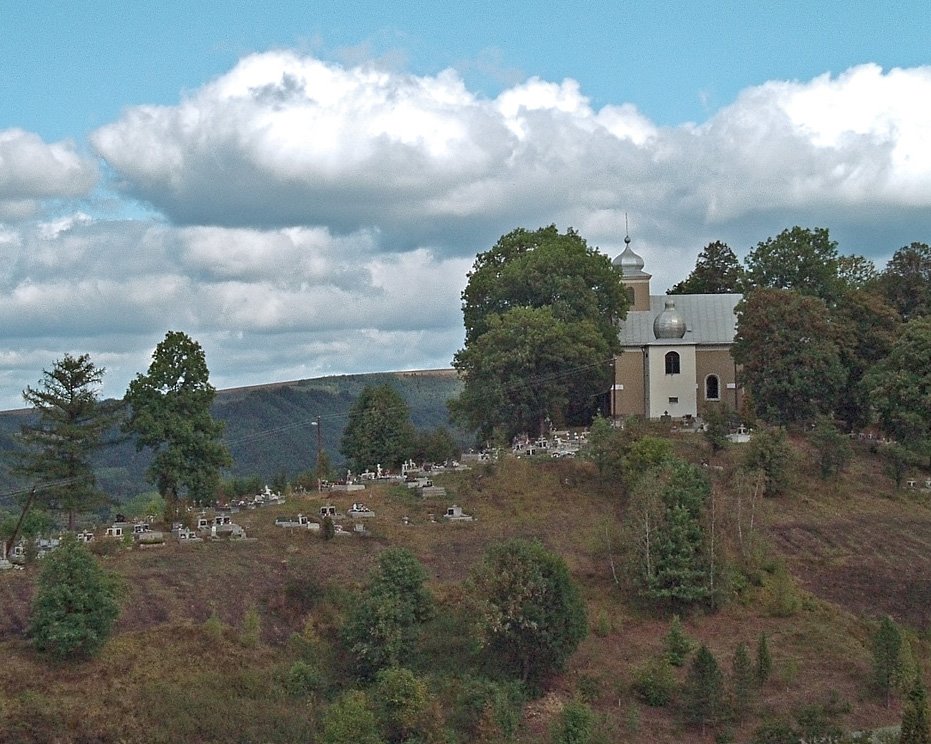 Greek Catolic Church with an adjacent cemetery in "Pcolinne" village by Dalibor Knis