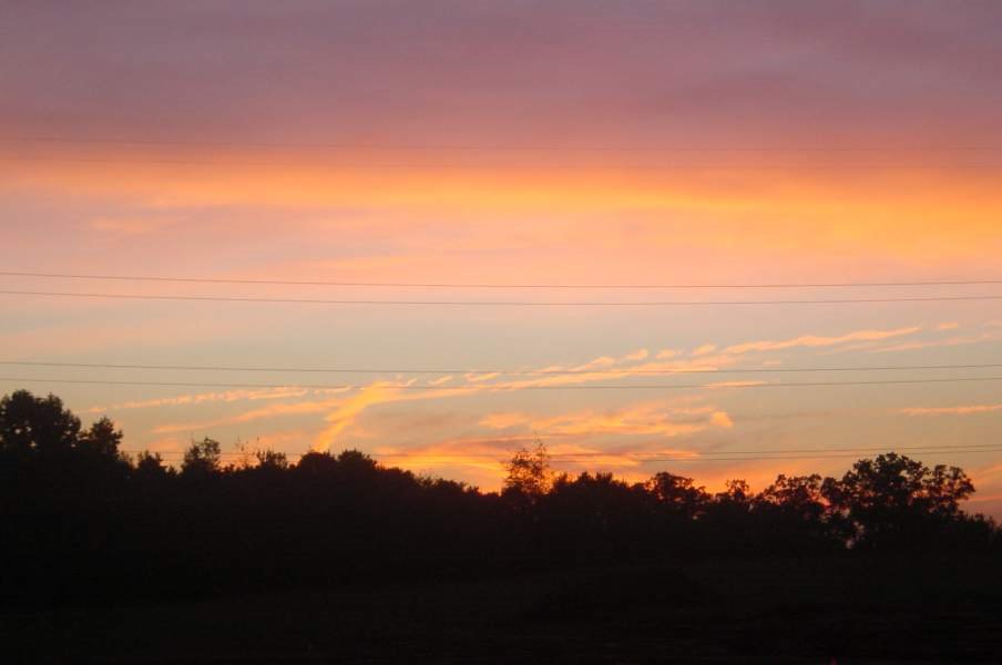 Hurricane Katrina's Clouds Sunset 9-1-2005 by Kyle Stephen Smith