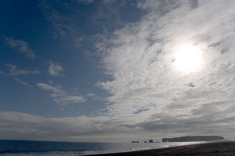 The arches of Dyrhólaey from the beach at Reynisfjara by tblackburn