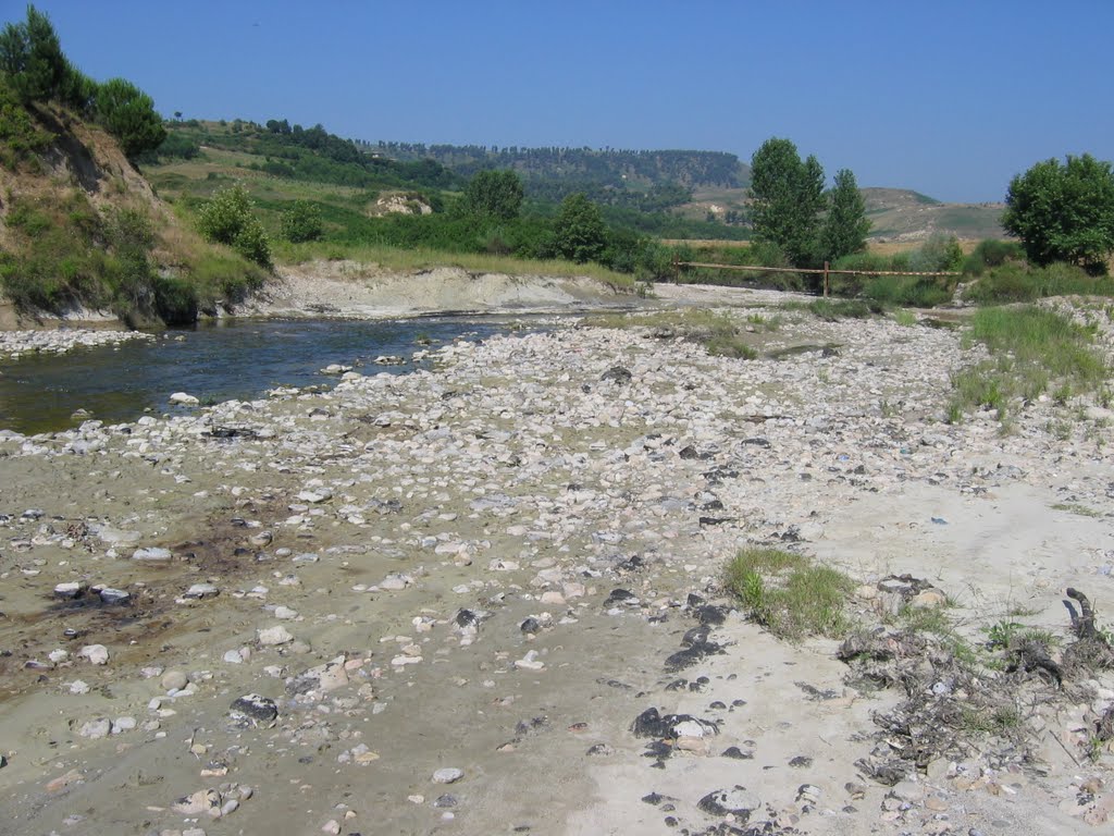 Tarry river scene near Fier - photo by Jessica L. - 2004 by MaxFarrar