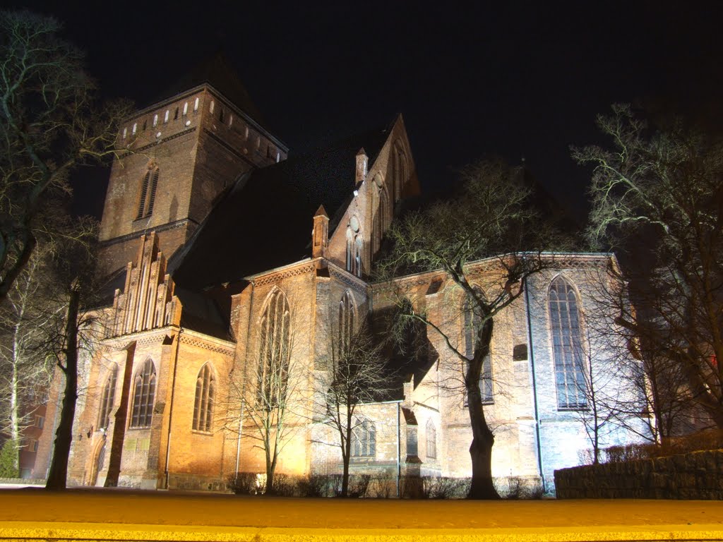 Church in Goleniów by night by Krzysio Milewicz