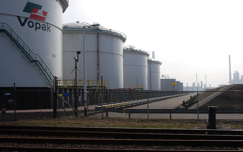 Rotterdam, Europoort, 45 KM of Oil Refineries, Harbours and Container Shipping by Hans J.S.C. Jongstra