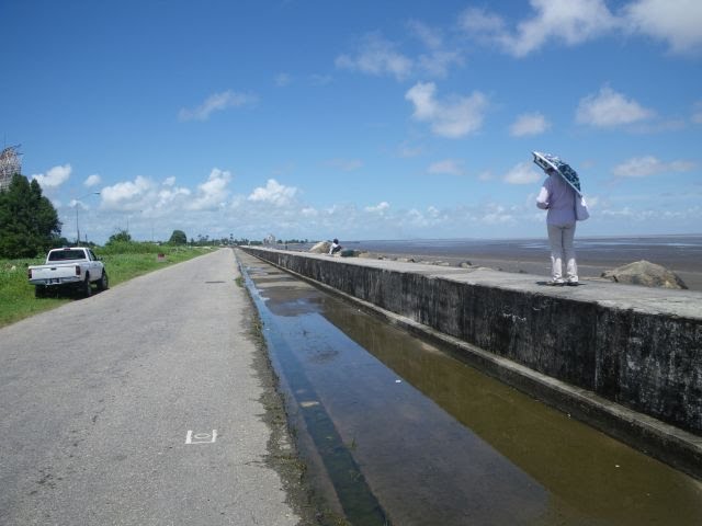 Sea wall (top embankment structure) to West by Shiny-green