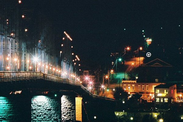 Walking Bridge at Night by Samuel Chase