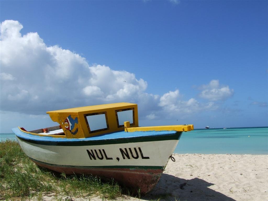 Aruban Fishing Boat on the Fshermans Huts Beach by Dean Silva