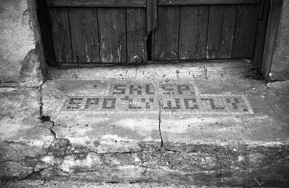 Inscription on the step of former shop. by Antanas Kairys